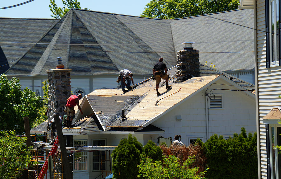 men working on the roof top 